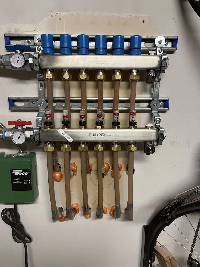 Plumber performing Water Heater Repair at a residential property in Lawrenceburg